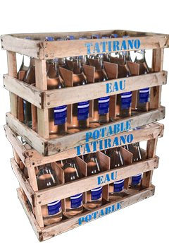 Two crates of Tatirano glass bottles